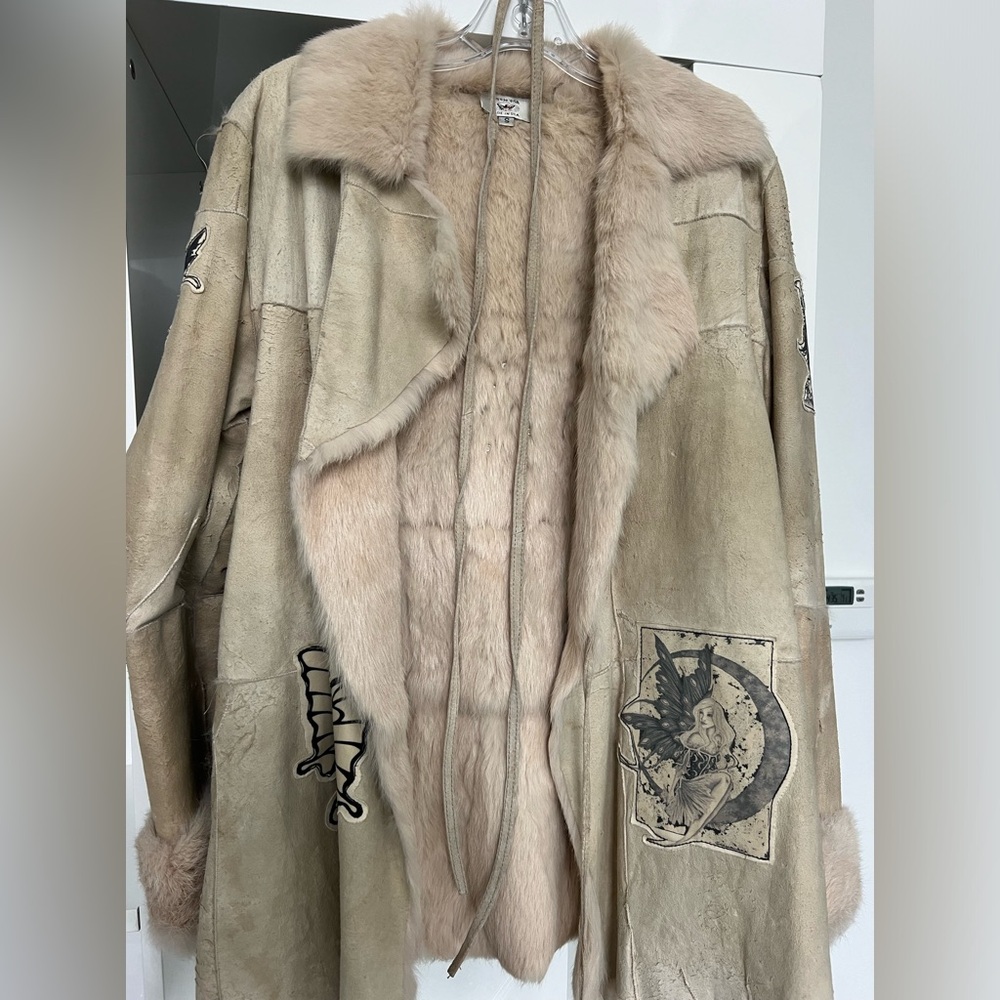 A fair jacket, real fair beige color color size small very warm